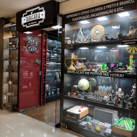 Logo da loja tabacaria da granja